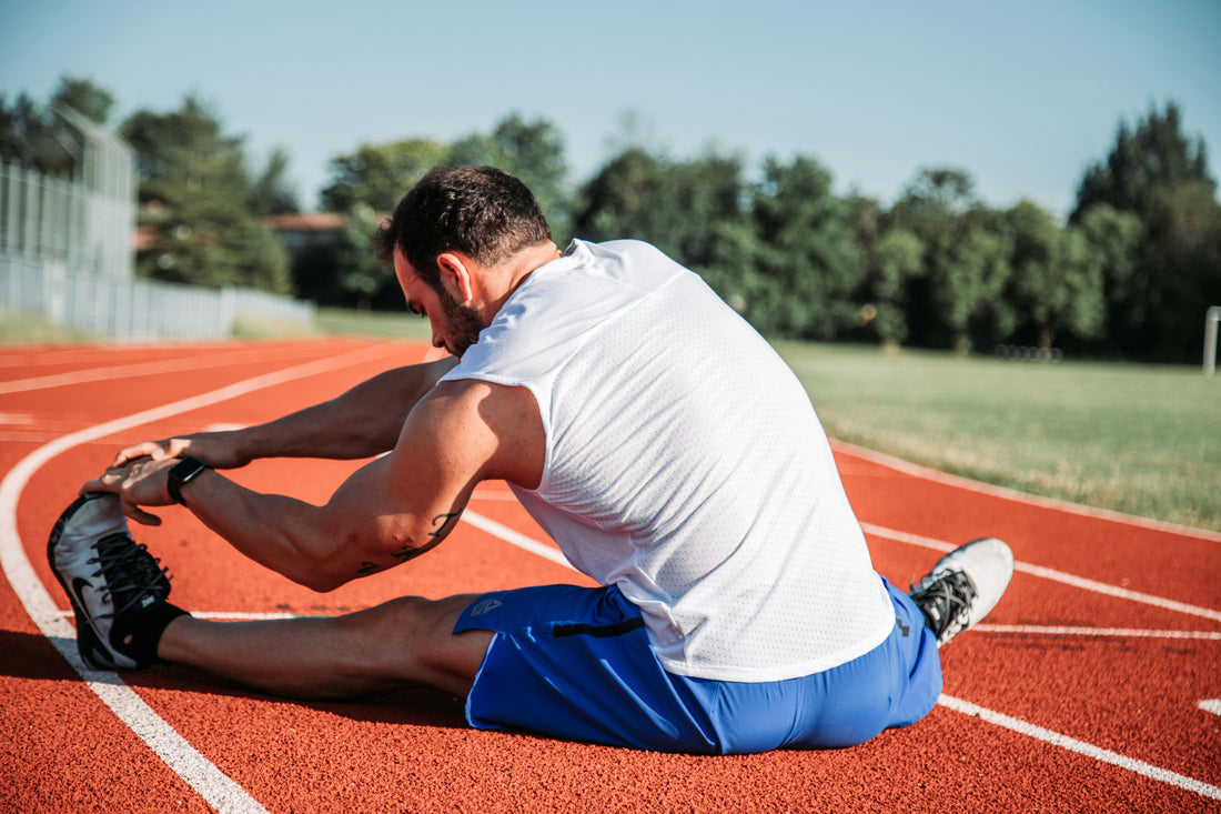 athlète sur une piste d'athlétisme
